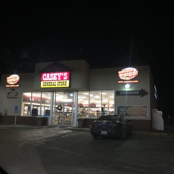 Casey's - the outside of a fast food restaurant at night - Pizza Near Me - Springfield, Nebraska Casey's - the outside of a fast food restaurant at night - Pizza Near Me - Springfield, Nebraska