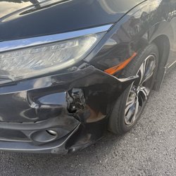 Cuban Eyes Auto Body Shop - Car damaged
