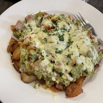 Rosine's Restaurant - Portofino Scramble: egg scramble with pesto sauce, turkey, tomato and breakfast potatoes - American Near Me - Monterey, California Rosine's Restaurant - Portofino Scramble: egg scramble with pesto sauce, turkey, tomato and breakfast potatoes - American Near Me - Monterey, California