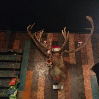 Dutch's Brewhouse - Alvin the reindeer, dressed for Christmas. - Breweries Near Me - Long Beach, California
