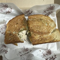 The Cheese Store of Cedarhurst - Tuna panini with bite mark