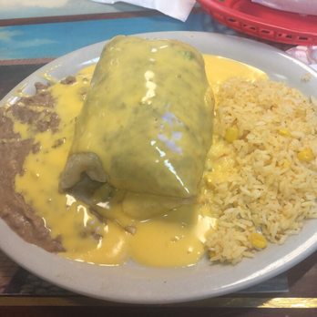 Taqueria Arandas - Carne Asada burrito smothered in queso with rice and beans - Mexican Near Me - Austin, Texas Taqueria Arandas - Carne Asada burrito smothered in queso with rice and beans - Mexican Near Me - Austin, Texas