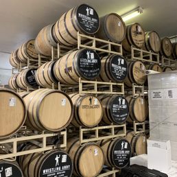 barrels stacked on pallets in a warehouse