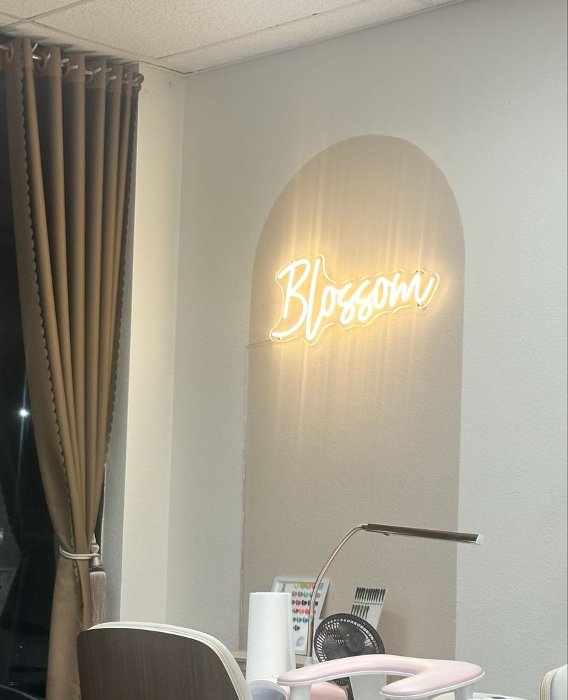 Blossom Nails And Spa Logo