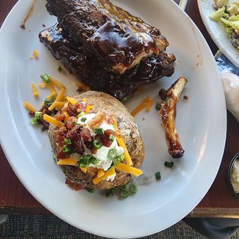 Ruby Tuesday - Full Size Ribs with Loaded Bake Potato. - Burgers Near Me - Henderson, North Carolina