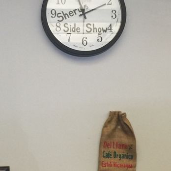 Side Show - a bag of coffee next to a clock - Coffee & Tea Near Me - Sacramento, California
