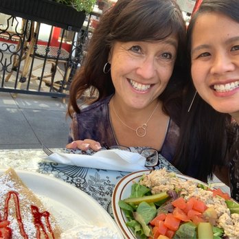 Crepes de Paris - We chose this cute little table out on the sidewalk in front of the restaurant. - Creperies Near Me - Brea, California