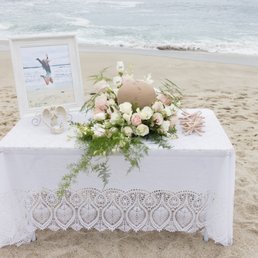 Beautiful urn arrangement by Roses Say