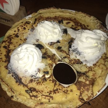 The Pancake Bakery - Dutch pancake with bananas and chocolate syrup on the side! - Pancakes Near Me - Amsterdam, New Hampshire The Pancake Bakery - Dutch pancake with bananas and chocolate syrup on the side! - Pancakes Near Me - Amsterdam, New Hampshire