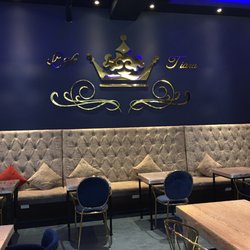 Cafe Tiara - Comfy tufted couches and half booths.