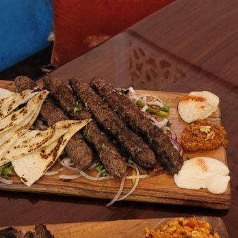 Baba Kabab - a variety of food on a cutting board - Persian/Iranian Near Me - Lafayette, Louisiana Baba Kabab - a variety of food on a cutting board - Persian/Iranian Near Me - Lafayette, Louisiana