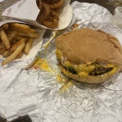 Trackside Burgers & BBQ - Single cheeseburger, onion rings and fries