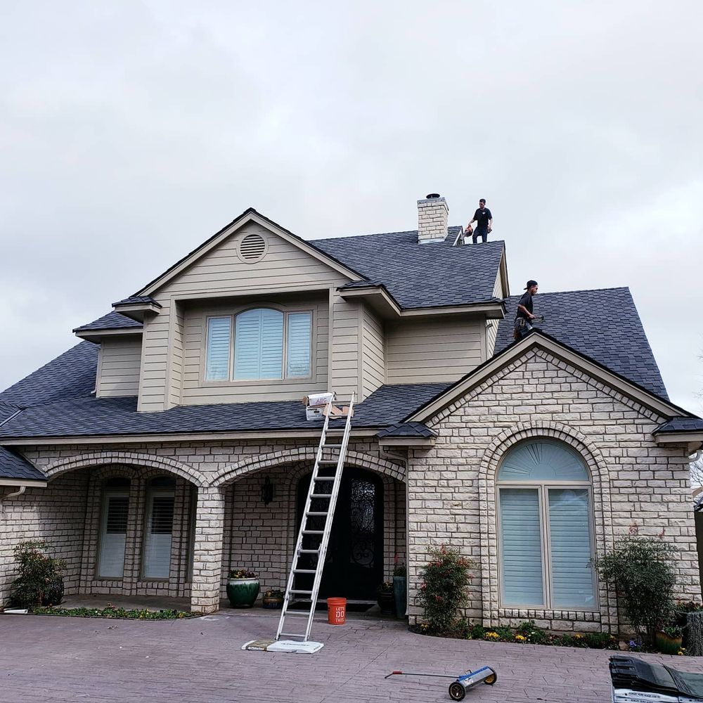 Slide of Cowtown Roofing