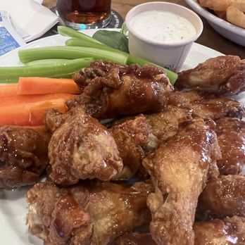 Mickie's Pub - Honey garlic wings - Sports Bars Near Me - Kelowna, British Columbia