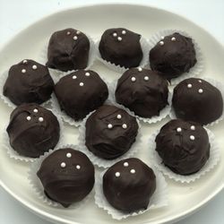 Double chocolate truffles. Chocolate cake balls covered in chocolate frosting!