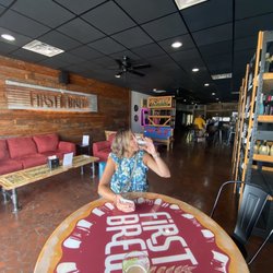 John’s pizza - The space... and a happy customer.