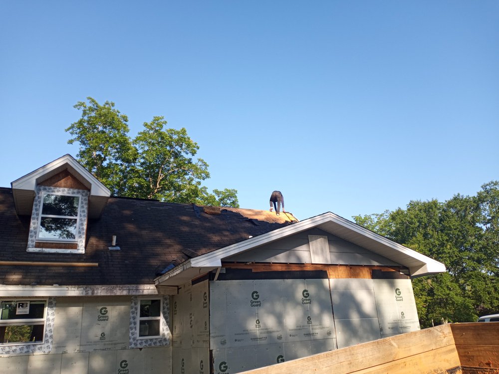 Slide of R and R Roofing Services