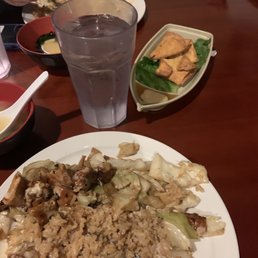 a plate of food and a glass of water