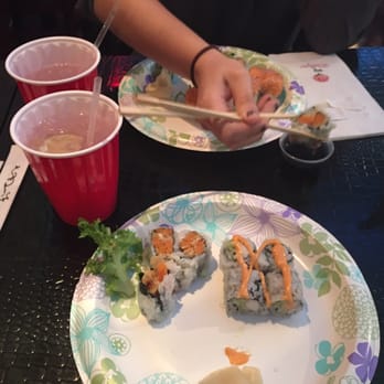 Yama Fuji Sushi - a person eating sushi with chopsticks - Sushi Bars Near Me - Briarcliff Manor, New York Yama Fuji Sushi - a person eating sushi with chopsticks - Sushi Bars Near Me - Briarcliff Manor, New York