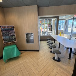 McDonald's - play place now hiring sign, dining area