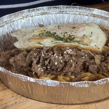 Nguyen's Kitchen - $15.95 Garlic Noodle with Bulgogi + egg extra $2.45 - Vietnamese Near Me - Orange, California Nguyen's Kitchen - $15.95 Garlic Noodle with Bulgogi + egg extra $2.45 - Vietnamese Near Me - Orange, California