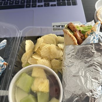 Tazikis Mediterranean Cafe - Spicy harissa chicken gyro ( FRESH FRUIT SIDE) - Mediterranean Near Me - Irving, Texas Tazikis Mediterranean Cafe - Spicy harissa chicken gyro ( FRESH FRUIT SIDE) - Mediterranean Near Me - Irving, Texas