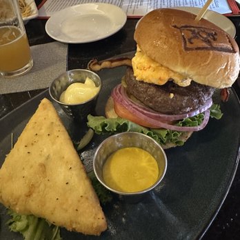 Second Street American Bistro - Carolina burger with Gouda grit cake....the burger was perfectly cooked to medium rare, exactly as I ordered it. - American Near Me - Williamsburg, Virginia Second Street American Bistro - Carolina burger with Gouda grit cake....the burger was perfectly cooked to medium rare, exactly as I ordered it. - American Near Me - Williamsburg, Virginia
