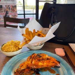 The Port of Peri Peri - *1/4 Chicken Breast Wing *Port Rice *Fries