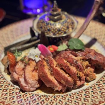 MaKiin - Spicy sausage stuffed pork chop - Thai Near Me - Houston, Texas