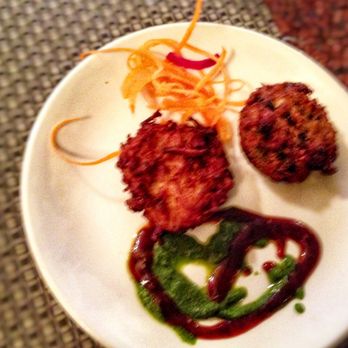 The Host Fine Indian Cuisine - Bhajia (vegetable onion fritter). - Indian Near Me - Toronto, Ontario The Host Fine Indian Cuisine - Bhajia (vegetable onion fritter). - Indian Near Me - Toronto, Ontario