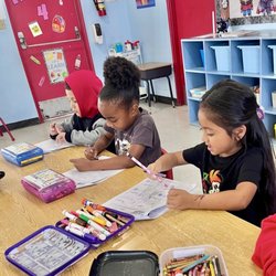 Kid Town USA Preschool & Kindergarten - Kindergartners at work