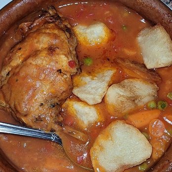 Costa Brava - Conejo - rabbit in tomato sauce and potato - Tapas Bars Near Me - San Diego, California Costa Brava - Conejo - rabbit in tomato sauce and potato - Tapas Bars Near Me - San Diego, California