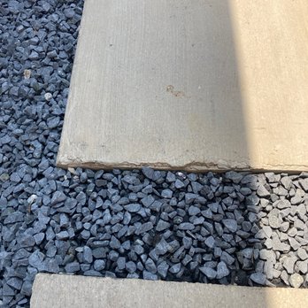 Pristine Landscaping and Lighting. - Very "untailored" stepping stone - Landscaping Near Me
