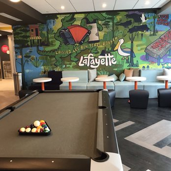 Tru by Hilton Lafayette River Ranch - Lobby with pool table - Hotels Near Me - Lafayette, Louisiana Tru by Hilton Lafayette River Ranch - Lobby with pool table - Hotels Near Me - Lafayette, Louisiana