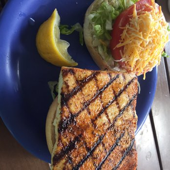 Coconuts Fish Cafe - Ono Sandwich with lettuce, tomato, cheese,and tarter sauce. - Seafood Near Me - Kihei, Hawaii Coconuts Fish Cafe - Ono Sandwich with lettuce, tomato, cheese,and tarter sauce. - Seafood Near Me - Kihei, Hawaii