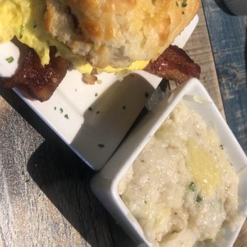 Gochas Breakfast Bar | Cascade - Bacon, egg, and cheese biscuit with cheese grits - Wine Bars Near Me - Atlanta, Georgia