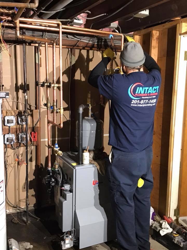 Slide of Intact Plumbing & Heating