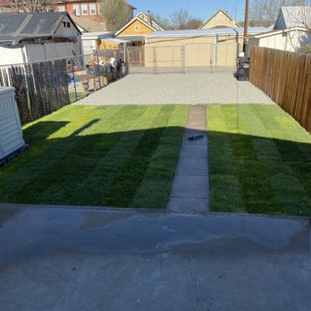 Vista Landscape Development - Back yard complete with sod and rock - Landscaping Near Me