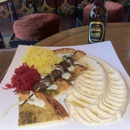 Beef kebab, yellow, rice, fresh, pita bread, homemade, hummus, and pickled (I fg) Beef kebab, yellow, rice, fresh, pita bread, homemade, hummus, and pickled (I fg)