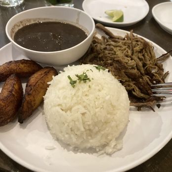 Mojo Cuban Kitchen and Rum Bar - Vaca Frita con arroz blanco, frijoles negros y maduros - Cuban Near Me - Tucson, Arizona Mojo Cuban Kitchen and Rum Bar - Vaca Frita con arroz blanco, frijoles negros y maduros - Cuban Near Me - Tucson, Arizona