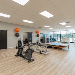 Prime - PRIME Physical Therapy - clean, open and inviting, PT Area.