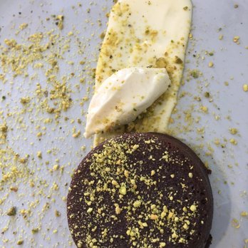 The Restorative - Chocolate cake with white chocolate and crushed pistachios - New American Near Me - Dunedin, Florida The Restorative - Chocolate cake with white chocolate and crushed pistachios - New American Near Me - Dunedin, Florida