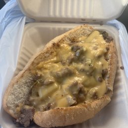 Nae Nae Philly with grilled onions, green bell peppers with vegan Philly meat and vegan "cheez" sauce on a toasted bun. Huge serving!