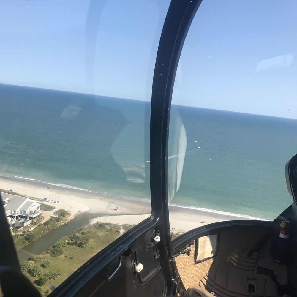 Picture of the landscape outside of the helicopter Picture of the landscape outside of the helicopter