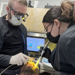 David Wagner, DDS - Dr. Wagner & Alyssa, his amazing Assistant! Both working on a very comfortable client.