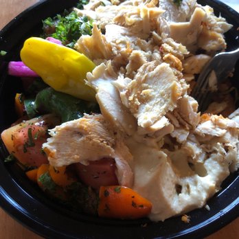 Amir - a bowl of food with a fork in it - Lebanese Near Me - Montreal, Quebec Amir - a bowl of food with a fork in it - Lebanese Near Me - Montreal, Quebec
