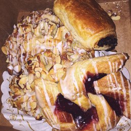 Raspberry danish, chocolate croissant, and almond bear claws.
