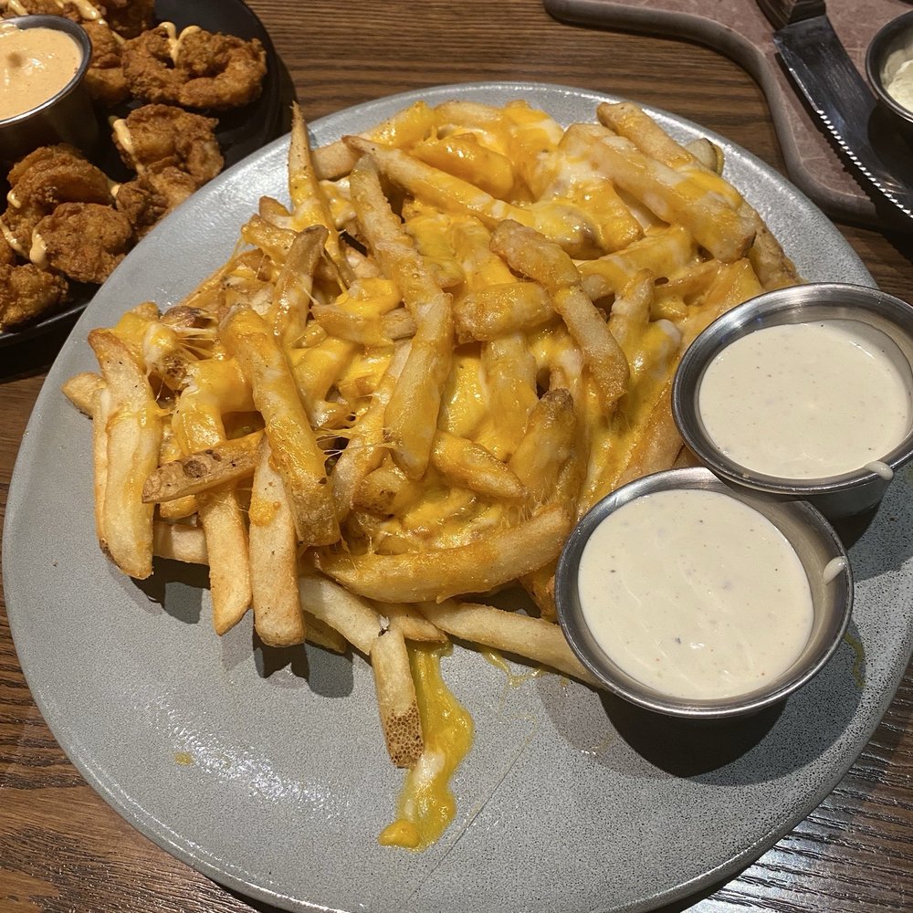Outback Steakhouse - Aussie Cheese Fries - Steakhouses Near Me - Wesley Chapel, Florida Outback Steakhouse - Aussie Cheese Fries - Steakhouses Near Me - Wesley Chapel, Florida