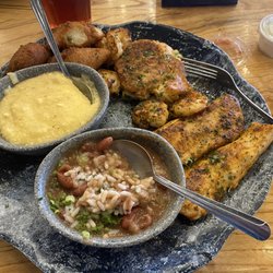 Wharf Casual Seafood Alexander City - Destin Platter with Gouda cheese grits and Red Beans and rice.