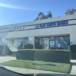 Flat Earth Games - Store front next to neighbor